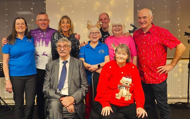 The wonderful staff at Dementia Sings Out in Wellingborough with residents from Elm Bank Care Home