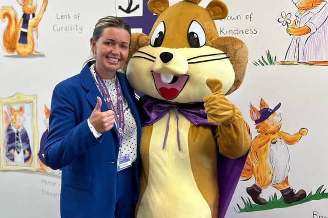Claire Petrie with 'squirrel' mascot