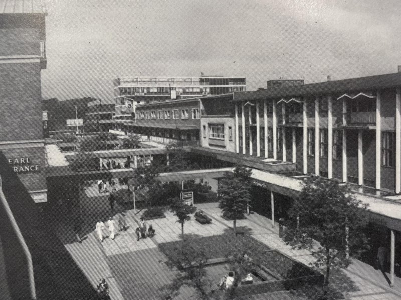 It's thought this image dates from around 1984 when the centre still had its covered walkways. The image is taken from the balcony of the old council offices.
