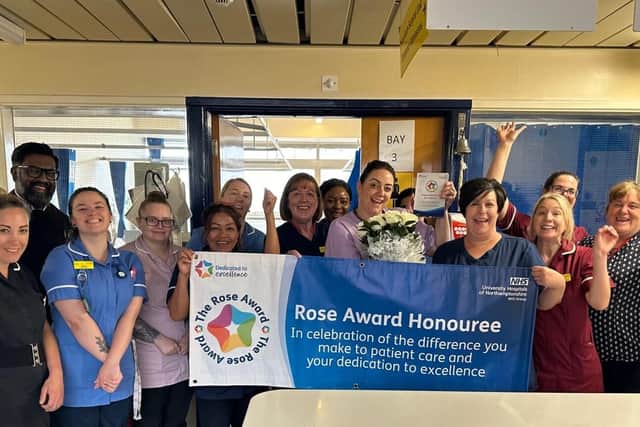 Deene A Ward team help Michelle to celebrate.
