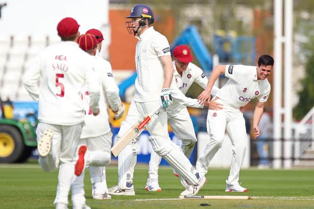 Liam Guthrie celebrates after dismissing England opener Zak Crawley (Picture: Peter Short)