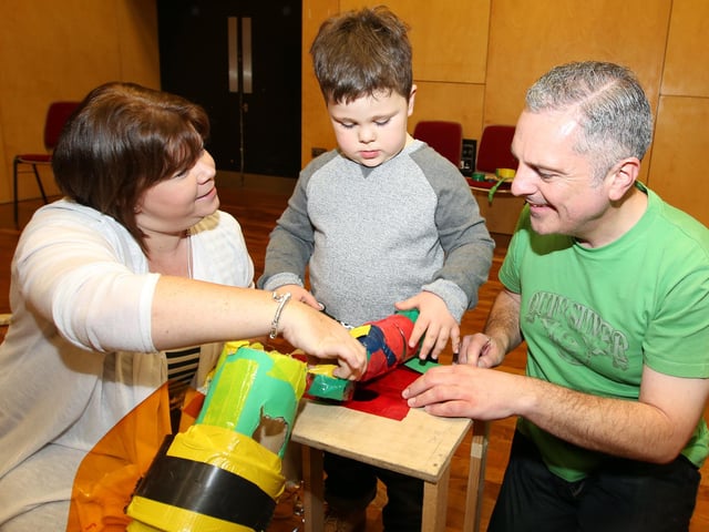 The Core at Corby Cube 5th birthday celebrations - giant marble run l-r Rachel Searle with son Ethan Taylor, 5, dad Brian Taylor (November 2015)