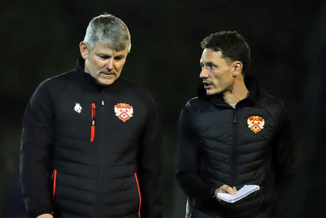 Boss Lee Glover and assistant Frankie Fry will be looking for an improvement from Kettering Town on the road this weekend. Picture by Peter Short
