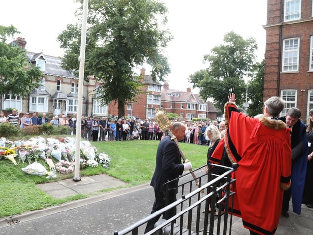 The Mayor of Kettering thanked members of the public for coming and invited them to lay flowers and sign the book of condolence