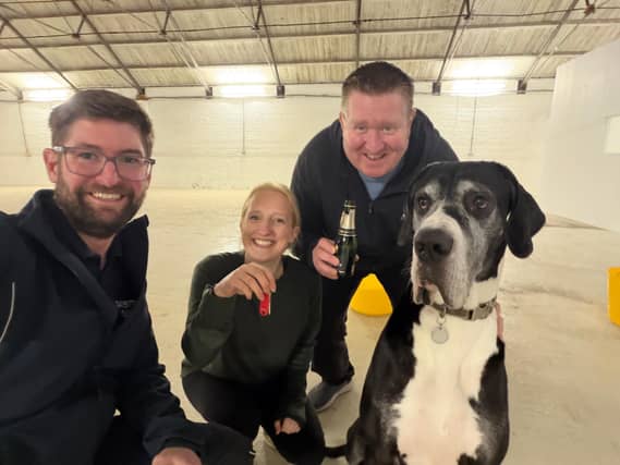 Gary, Kate, Barry and Biggie-Smalls (dog) collecting the keys to The Court Yard