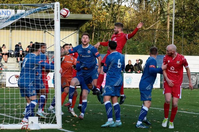 Wellingborough Town's Jack O'Connor hits the bar with a header during his side's 2-0 defeat at Sutton Coldfield on Saturday (Picture: Rib Wobb Photography)