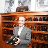 Tony Gaziano with a pair of bow pump shoes similar to the ones that will be worn by The King