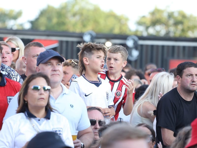 Fans at the Kettering Town FC World Cup Fan Zone watch England vs Argentina in the semi-final