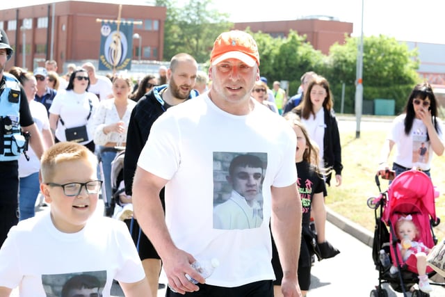 The family of Shane Woodbine, who was murdered in 2005, joined in the march