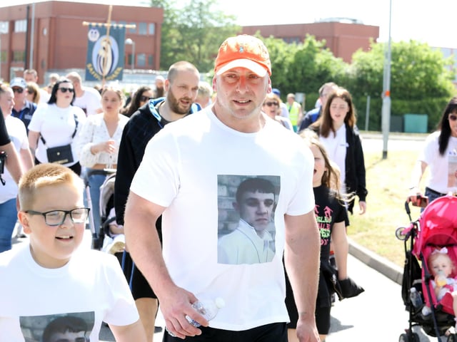 The family of Shane Woodbine, who was murdered in 2005, joined in the march