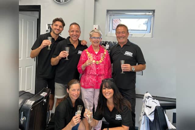 Kettering mayor Cllr Keli Watts celebrates Salon 101's anniversary with staff including owner Vince D'Arienzo, pictured back right.