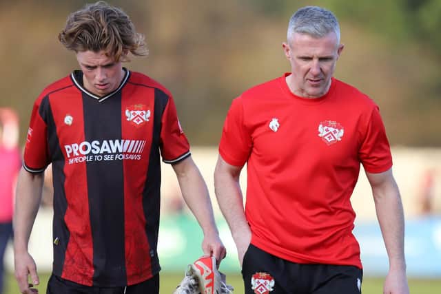 Kettering boss Richard Lavery (right) and Sam McLintock show their disappointment after Saturday's defeat to St Ives