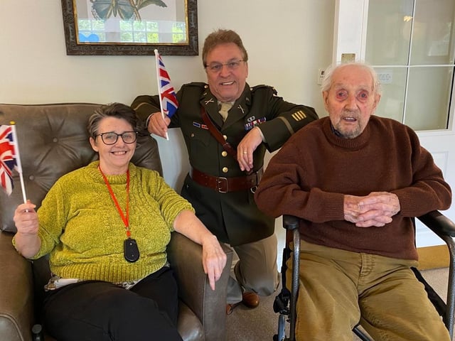 Rodney Dell with residents who joined in singing along to the renditions of music from the past