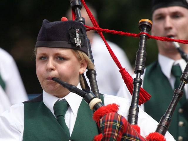 SDPBHD pipers go in front of the judges at Corby's Highland Gathering