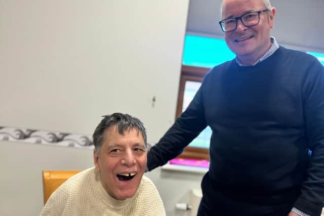 Lee Barron pictured with a person supported by Voyage Care