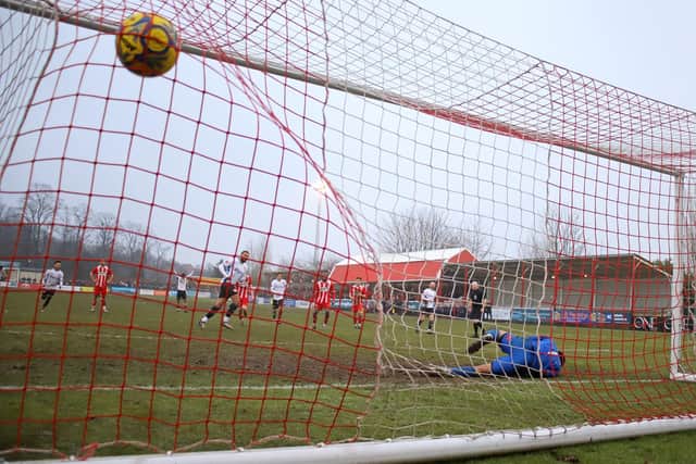 Jonny Edwards nets from the penalty spot to put Kettering 3-0 ahead at Stourbridge (Picture: Peter Short)