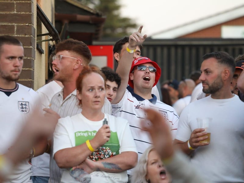 Fans at the Kettering Town FC World Cup Fan Zone watch England vs Argentina in the semi-final