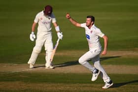 Somerset's Craig Overton celebrates the crucial wicket of Northants skipper Will Young