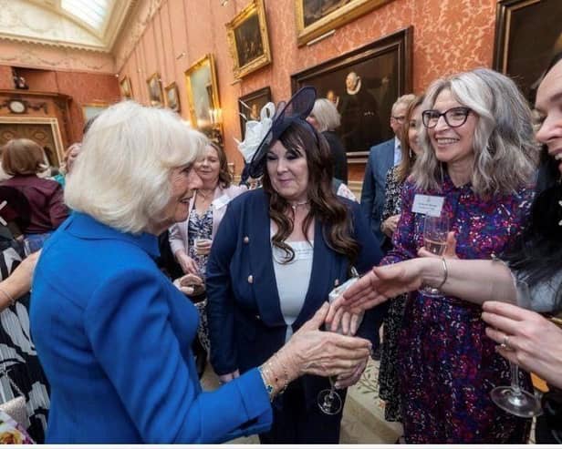 Fay Wickett and Maria Hutchinson from Serenity meeting Her Majesty The Queen
