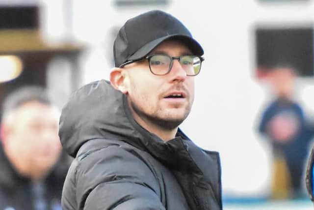 Boss Jake Stones has put pen to paper on a new deal at Wellingborough Town (Picture: Shaun Frankham)