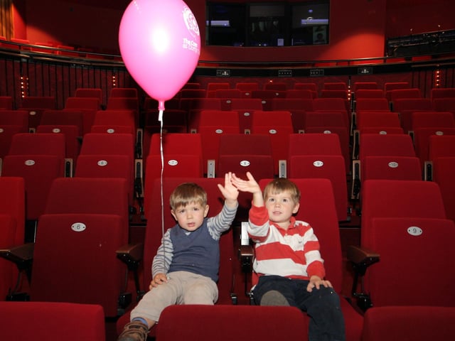 Corby The Core's 1st birthday: First in the theatre for a panto preview, brothers two-and-a-half year old Henry with Louis Spiers, four, make sure they get the best seats (November 2011)