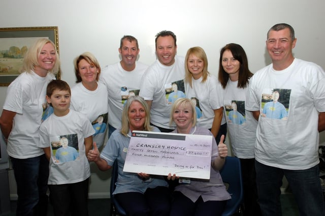 Kettering: Cransley Hospice cheque presentation from the friends of Danny Liquorish 
Nurses Barbara Stephenson and Kim Walker receive the £ 38,400 cheque from Ged Coles, Ben Tompkins, Sam Burton, John Coe, Kevin Shoemake, Justine Tompkins, Natalie Edwards and Neil Edwards.
November 2010