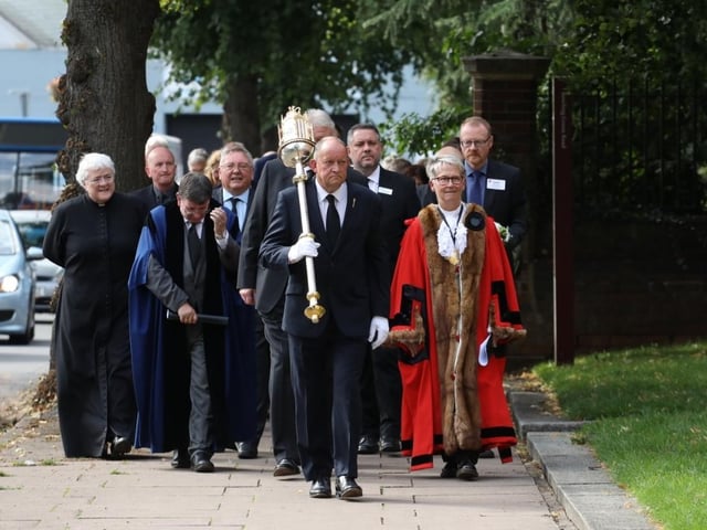 Dignitaries and the members of the public processed to Bowling Green Road to lay wreathes