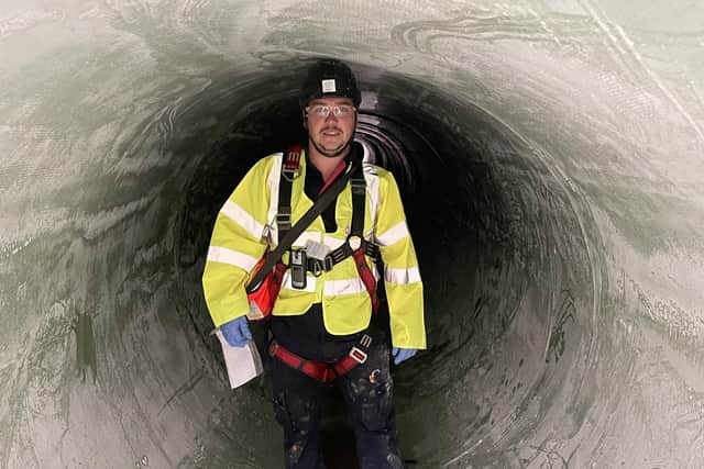 Lanes Corby liner Project Manager Gary Carey in lined pipe.