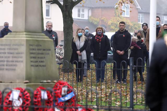 Corby people pay their respects at the war memorial