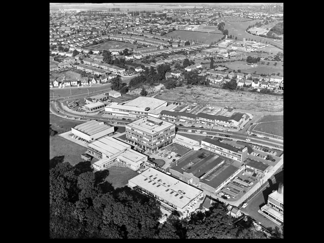 Corby - George Street with Tresham College in the foreground 1970s