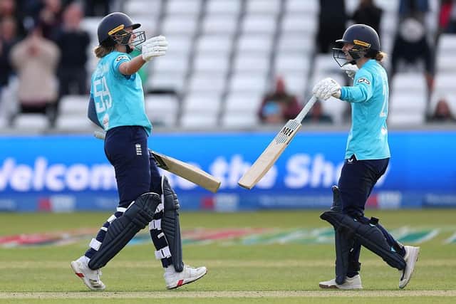 England batters Tilly Corteen-Coleman (left) and Charlie Dean celebrate victory against New Zealand on Sunday