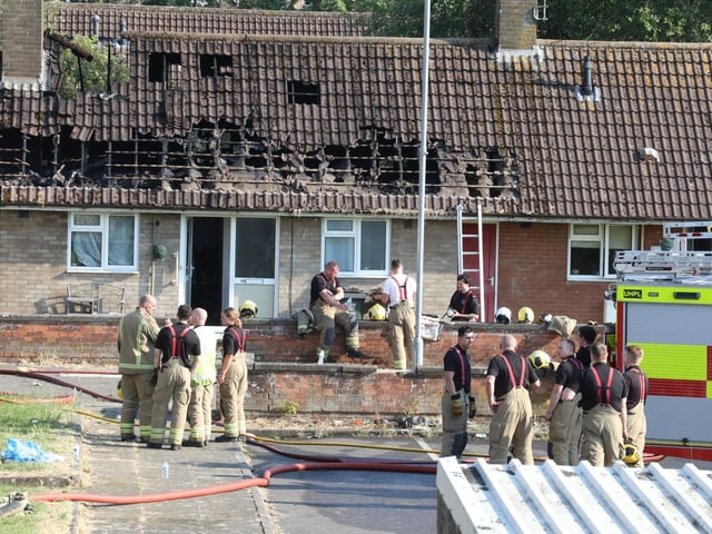 Emergency services on site at the house fire in Harrogate Court, Corby/National World