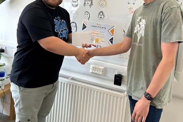 Semi-Senior Accountant Alex Ferdinandez, of Elsby & Co, with Year 12 student Brandon Saul
