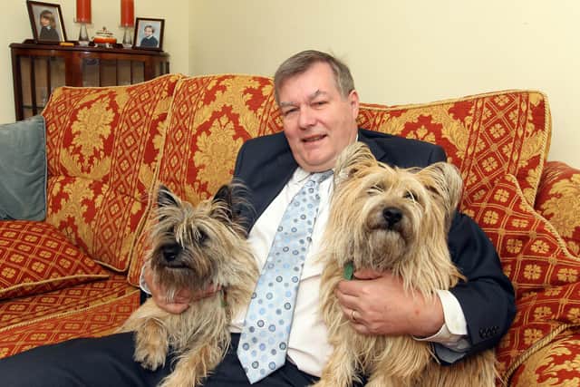Cllr David Jenney photographed in 2013 with his Cairn Terriers Lexie and Kenzie