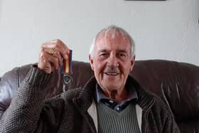 Roy Constable with his nuclear test medal.