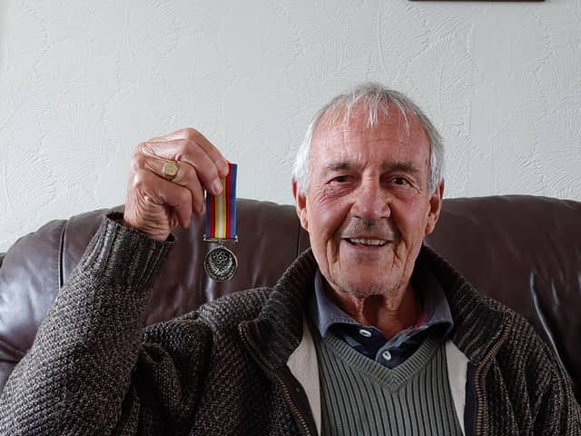 Roy Constable with his nuclear test medal.