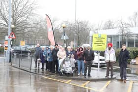 Rev Tom Houston (on right) with campaigners at the entrance to Sainsbury's car park in Rockingham Road Kettering /National World