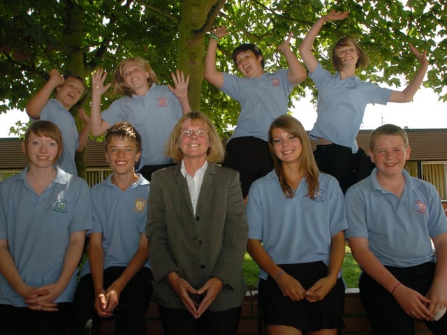 Pupils celebrate getting a good Ofsted report in July 2009. Back, from left, Zack Pugh, 13, Victoria Bodsworth, 14, Tom Cooper, 14 and Lydia Cartwright, 14. Front, Sophie Stopps, 14, Jake Nunley, 14, headteacher Linda Brooks, Jasmin Hobbs-Rex, 14, and Ewan Pattison, 14