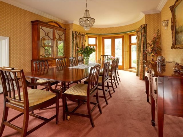The home has traditional features as well as an indoor swimming pool, equestrian facilities and extensive parkland.