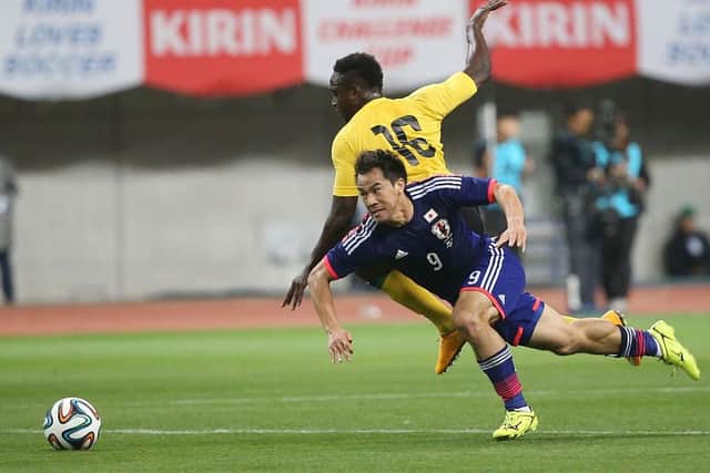 Jamar Loza in action for Jamaica against Japan