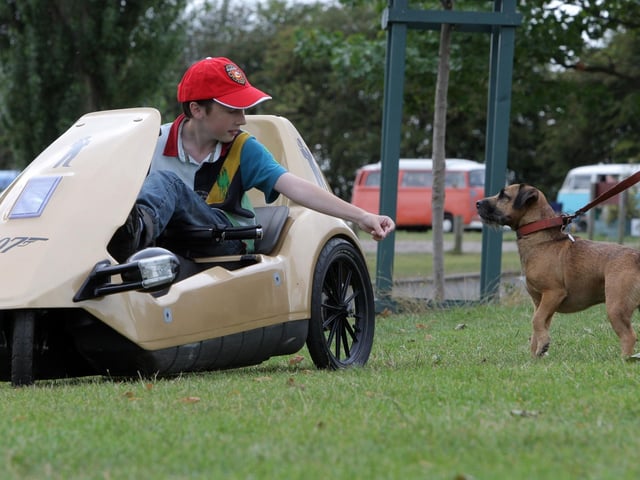 Kettering Wicksteed Park cycling event: 13 year old, Matthew Lindsay, in his Modified C5 with Ludo the dog.2011