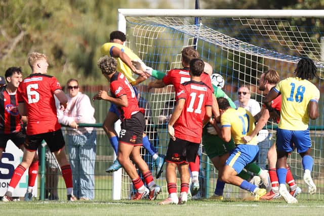 Rhys Kelly heads home Wellingborough's late equaliser (Picture: Peter Short)