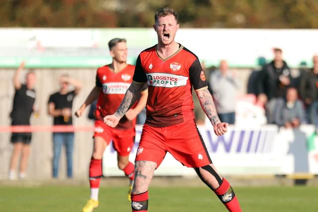 Brad Gascoigne shows his delight after his equaliser