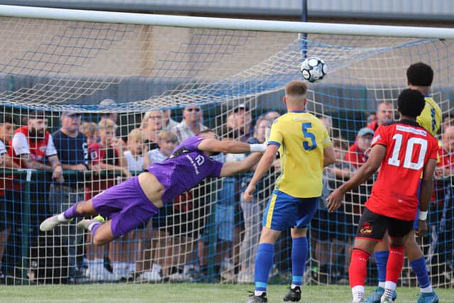Wellingborough goalkeeper Dean Snedker brilliantly keeps out Theo Alexandrou's effort (Picture: Peter Short)
