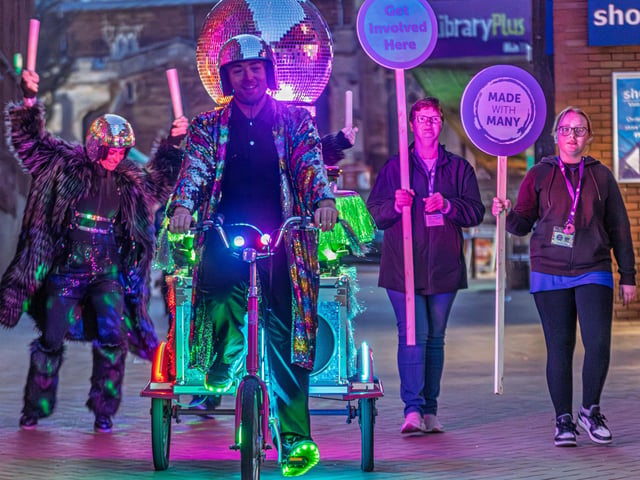 Groove N Glow, a mobile disco on wheels, makes its way to the final part of the festival