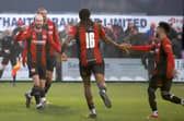 Isiah Noel-Williams celebrates with his team-mates after scoring Kettering's second goal versus Barwell (Picture: Peter Short)