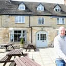 Darren and Shannon Harding outside The Woolpack Inn, Islip/National World