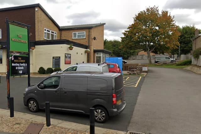 The housing would be built at the very back of The Woolcomber's car park, backing onto other residential properties. The only access route would be via the pub driveway.
Credit: Google