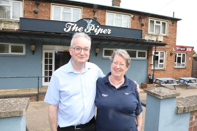 Garth and Sue Coward outside The Piper in Windmill Avenue, Kettering