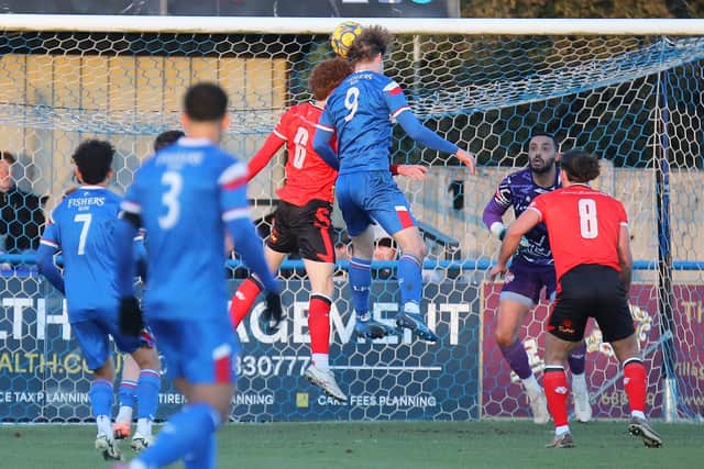 Ronnie  Blois rises above Will Glennon to head home Leiston's opening goal (Picture: Peter Short)